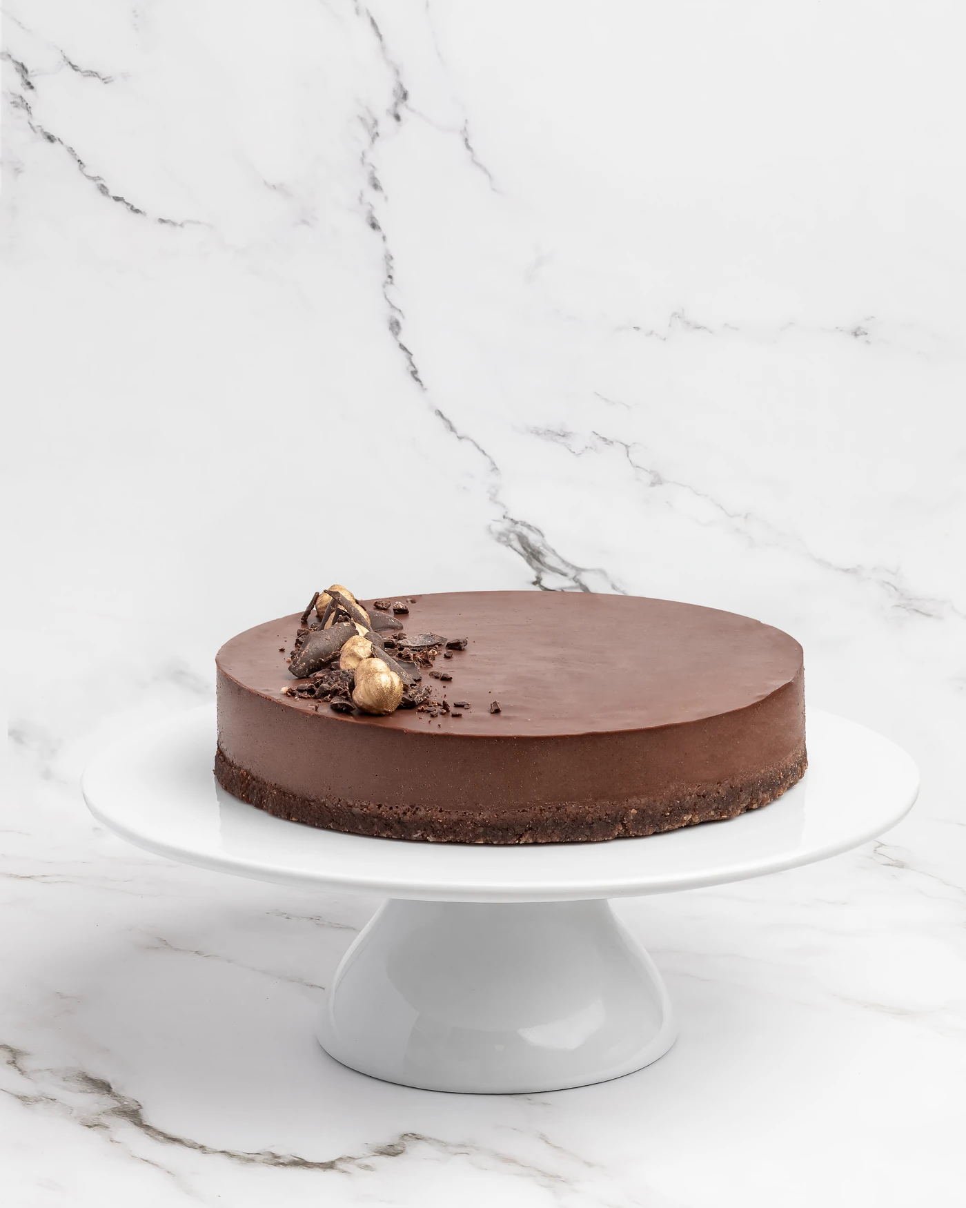 Dark chocolate cake on pedestal - minimalist chocolate presentation