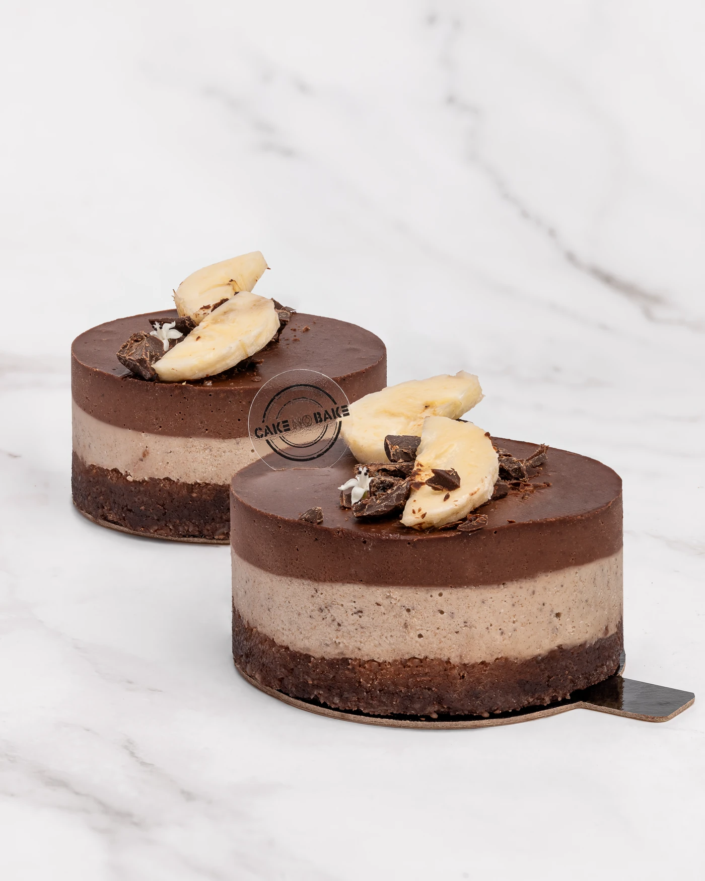 Triple chocolate cake with banana chips - three distinct layers