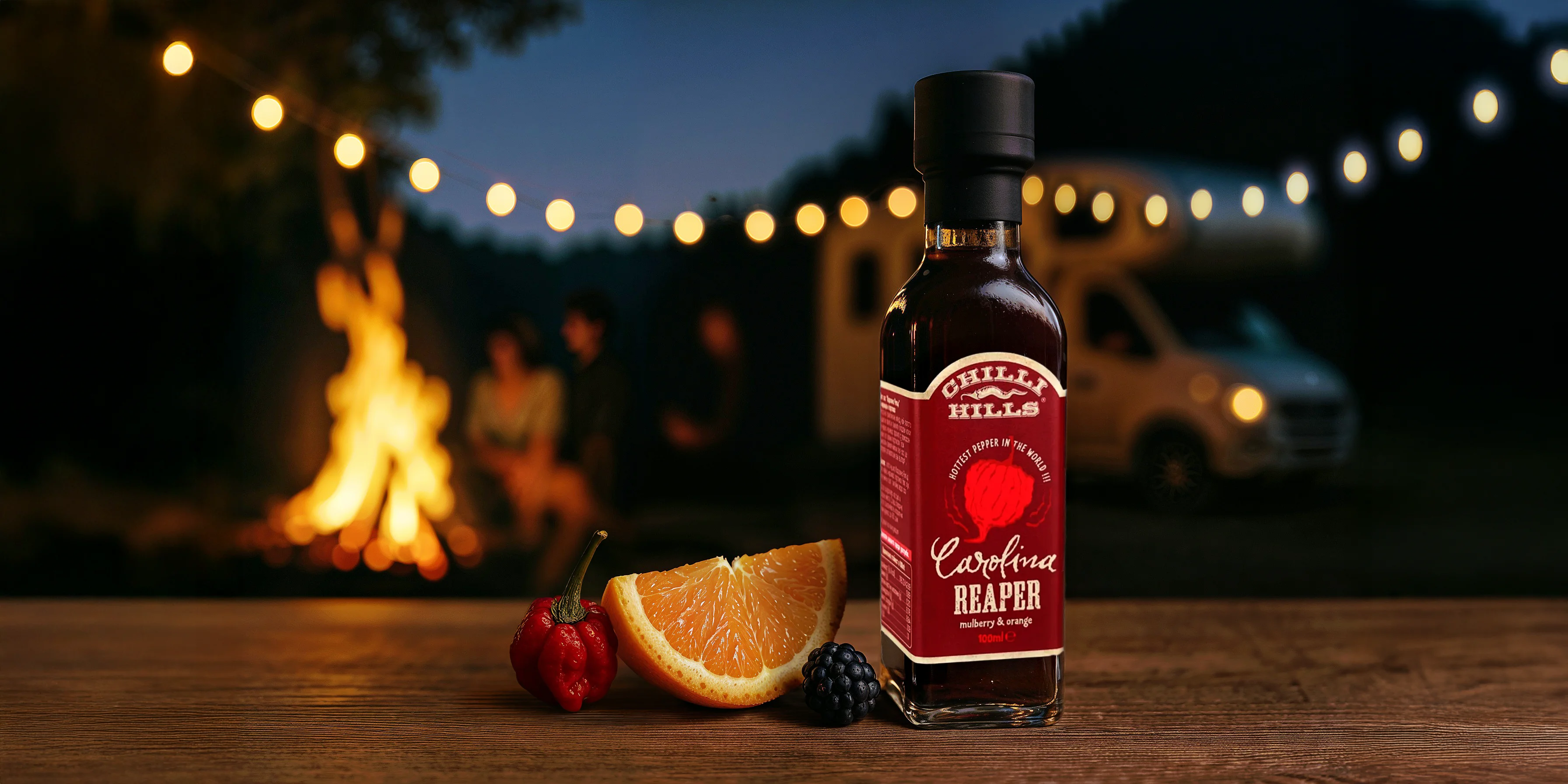 Chilli Hills Carolina Reaper bottle in AI-generated campfire evening scene with string lights