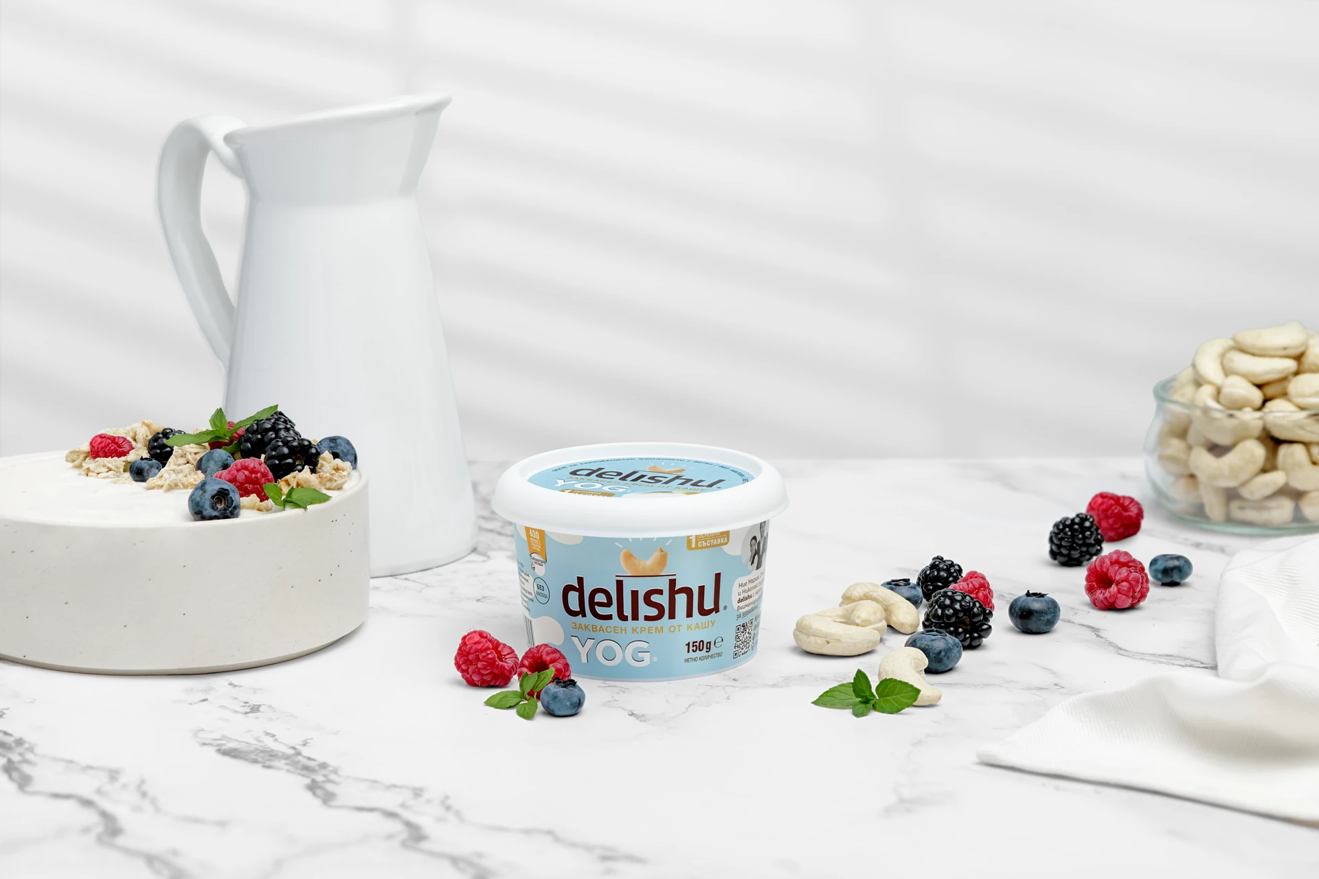 Delishu yogurt lifestyle photography with berries, cashews, and granola