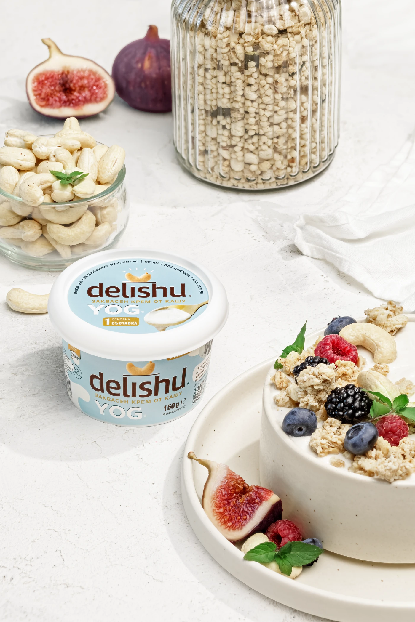 Delishu vegan yogurt lifestyle photography with fresh figs, cashews, and granola