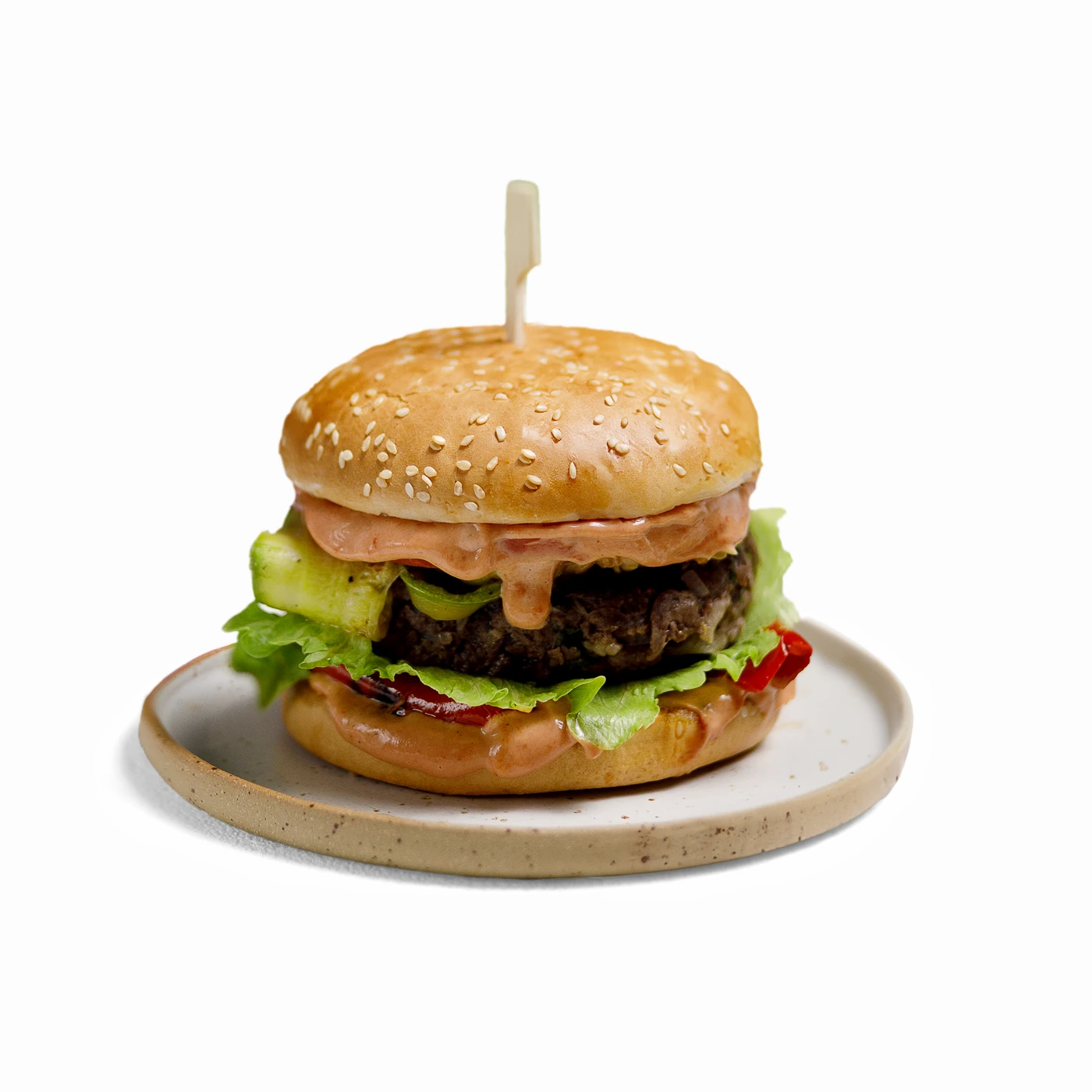 Готов gourmet burger с блясък от зехтин и професионално сервиране