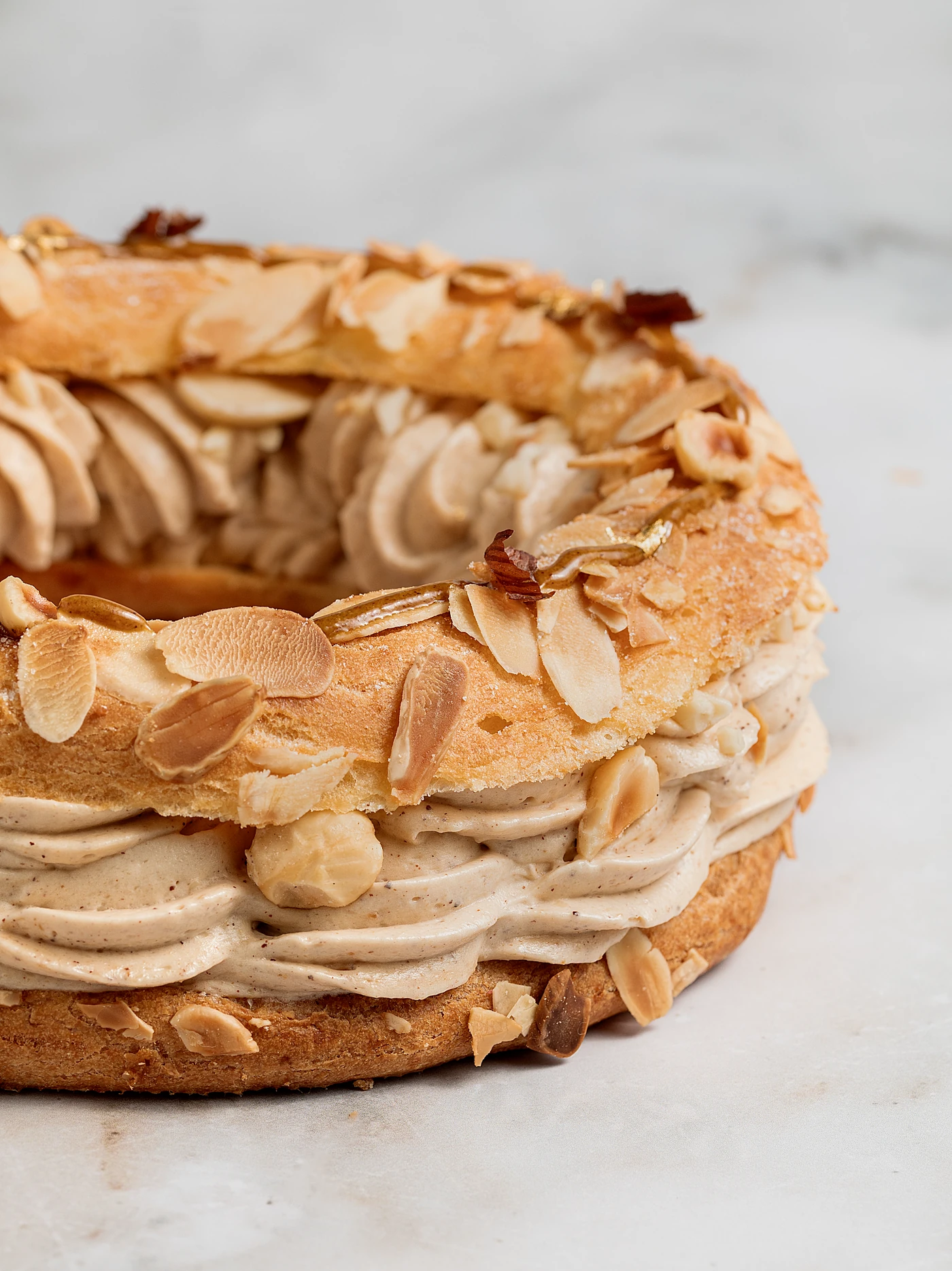 Paris-Brest - golden choux ring with praline cream and almonds