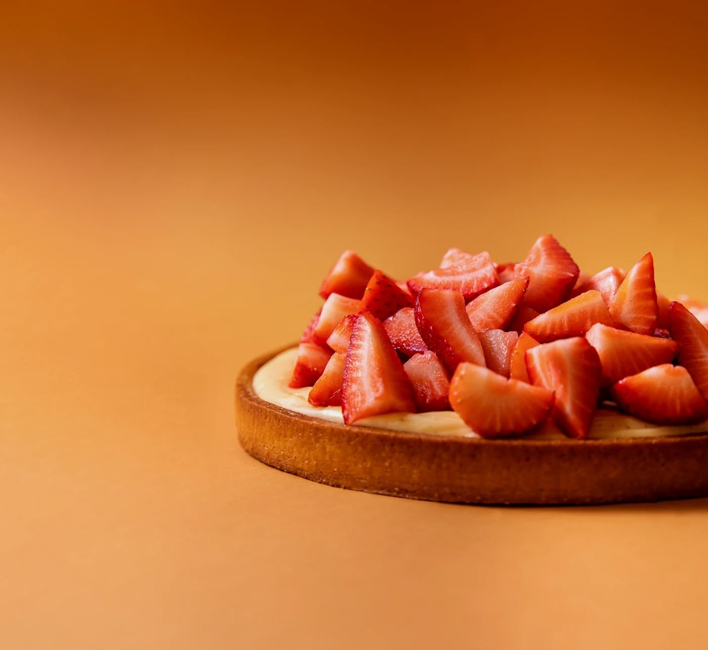 Fresh strawberry tart - vibrant top-down product shot