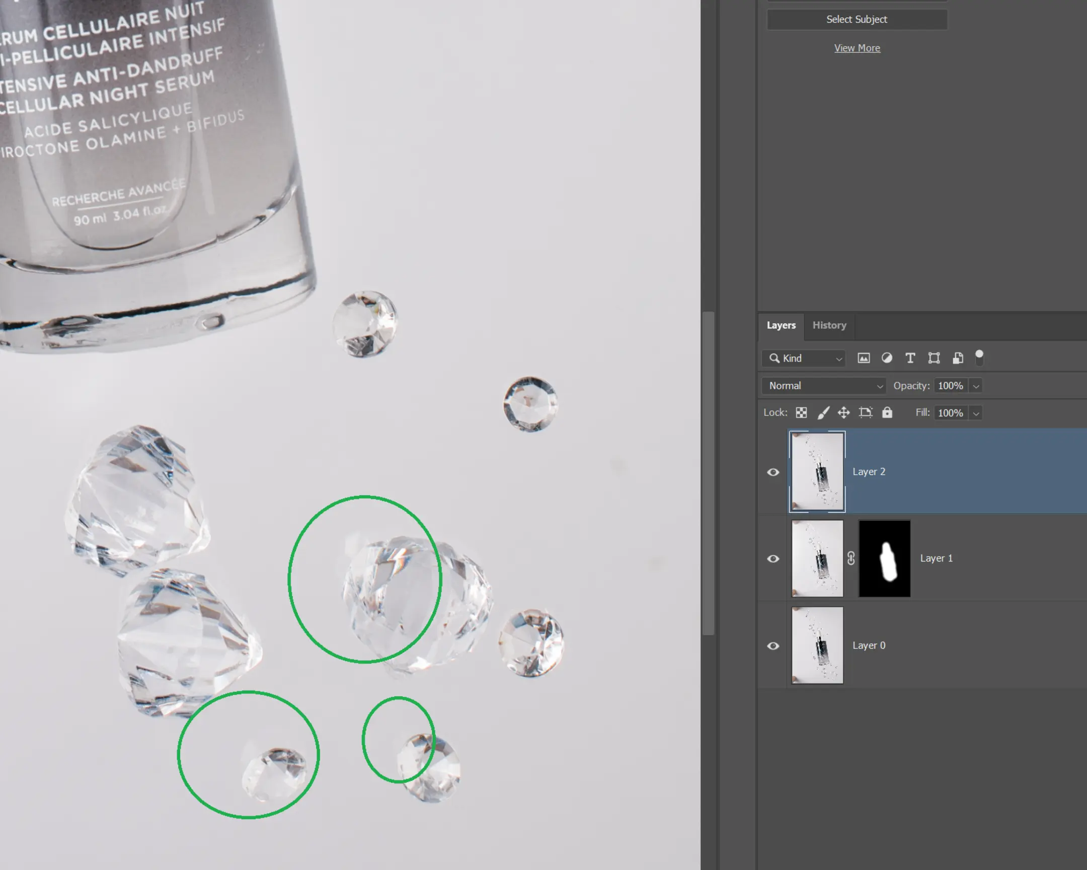Anti-Dandruff Cellular Night Serum bottle with floating faceted gems, showing editing for product photography using glass.