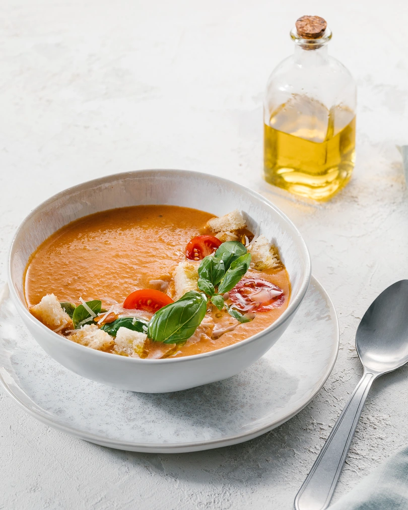 Papa al Pomodoro tomato soup with basil, cherry tomatoes, white bread croutons & olive oil.