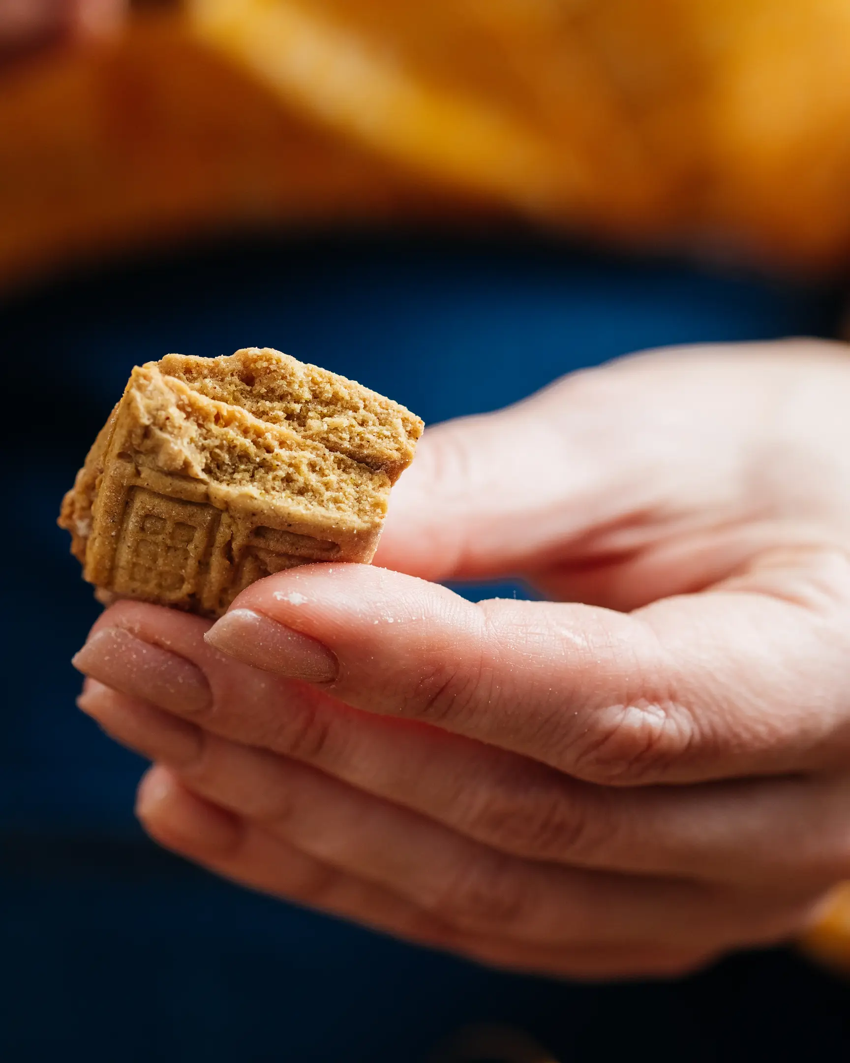 Delicious pumpkin scones with glaze, dried cranberries, and almonds, perfect for a crisp Fall morning.